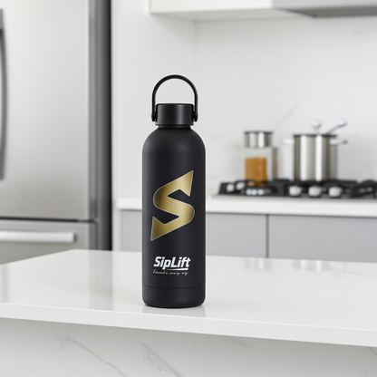 Black water bottle with gold logo and 'SipLift' branding on a kitchen counter.